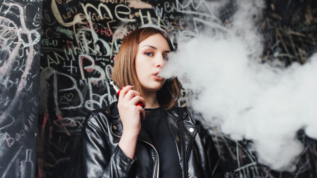 image of a woman vaping