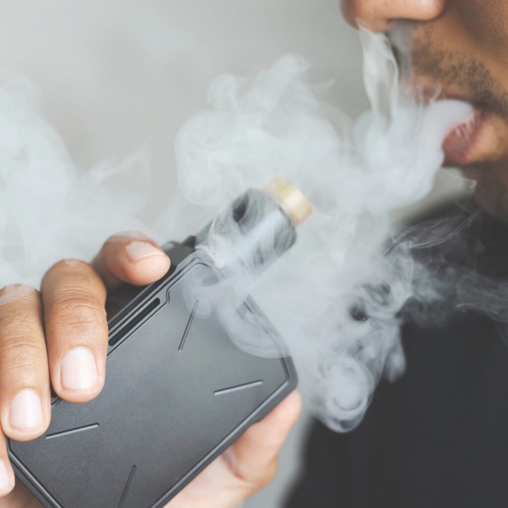 image of a man vaping